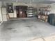 Spacious garage with ample storage shelving units and water heater for household needs at 527 Buckhaven Loop, Ocoee, FL 34761