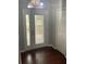 An entry way featuring hardwood floors, a front door, and a closet at 527 Buckhaven Loop, Ocoee, FL 34761