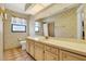 Bathroom featuring a vanity with floral wallpaper, tile floor, and a large mirror at 600 Heather Brite Cir, Apopka, FL 32712