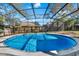 Private backyard features a screened pool with a concrete patio at 600 Heather Brite Cir, Apopka, FL 32712