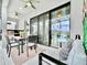 Covered patio featuring outdoor seating, a ceiling fan, and views of the pool area for comfortable outdoor enjoyment at 10012 Voyager Way, Orlando, FL 32821