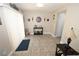 Welcoming entryway with ceramic tiled floors, complemented by wall decor and a stylish console table at 1009 Troon Trce, Winter Springs, FL 32708
