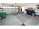 Spacious two car garage with tools, ample storage, and organization at 1009 Troon Trce, Winter Springs, FL 32708