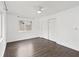 Clean, white bedroom with closet and large window at 1071 Sweet Tree Ct, Apopka, FL 32712