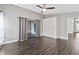 Spacious bedroom featuring an outdoor entrance, a ceiling fan, and ample closet space at 1071 Sweet Tree Ct, Apopka, FL 32712