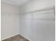Walk-in closet with wire shelving and neutral carpet at 1117 Pavia Dr, Apopka, FL 32703