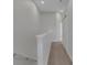 Upstairs hallway leading to bedrooms, featuring neutral paint and carpet at 1117 Pavia Dr, Apopka, FL 32703