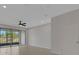 Bright room with sliding glass doors leading to lanai and outdoor space at 1117 Pavia Dr, Apopka, FL 32703