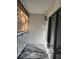 Balcony featuring a sunshade and sliding glass door at 1324 S Pine Ridge Cir # D2, Sanford, FL 32773
