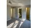 Bedroom highlighting easy access to bathroom and walk-in closet at 1324 S Pine Ridge Cir # D2, Sanford, FL 32773