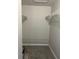 Walk-in closet equipped with shelves and rack for optimal storage at 1324 S Pine Ridge Cir # D2, Sanford, FL 32773