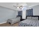 This bedroom features two beds and nautical decorations at 137 Golfside Cir, Sanford, FL 32773