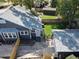 Aerial view of the property showcasing the home, detached garage, backyard, and surrounding neighborhood at 16 N Lawsona Blvd, Orlando, FL 32801