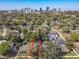 Aerial view of property with surrounding neighborhood and downtown skyline in background at 16 N Lawsona Blvd, Orlando, FL 32801