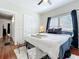 Bedroom featuring a ceiling fan and natural light creates a comfortable atmosphere at 16 N Lawsona Blvd, Orlando, FL 32801