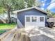 Backyard shot of the garage with a work area and backyard at 16 N Lawsona Blvd, Orlando, FL 32801
