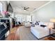 Bright living room with stylish furniture, a fireplace, and views of the exterior at 16 N Lawsona Blvd, Orlando, FL 32801