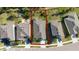 Aerial view of home showcasing roof, lawn, landscaping, driveway, and backyard at 17216 Goldcrest Loop, Clermont, FL 34714