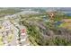 Aerial community view showcasing a pool and scenic landscaping at 17216 Goldcrest Loop, Clermont, FL 34714