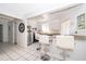 Bright kitchen with granite countertops and stainless steel appliances at 1735 Foxhall Cir # 1735, Kissimmee, FL 34741