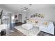 Cozy living room featuring a sectional sofa, stylish rug, and an open layout at 1865 Sanderling Dr, Clermont, FL 34711