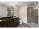 Spacious bathroom featuring tile flooring, dual vanity, and a glass-enclosed shower at 2015 Shalimar Loop, Sanford, FL 32773