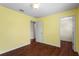 Bedroom with wood floors and access to a walk-in closet at 2015 Shalimar Loop, Sanford, FL 32773