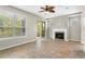Large living room featuring a fireplace, neutral walls, and tile flooring at 2015 Shalimar Loop, Sanford, FL 32773