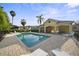 Community pool with lounge chairs and covered picnic area on a sunny day at 2015 Shalimar Loop, Sanford, FL 32773