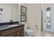 Bathroom featuring a black countertop vanity and walk-in shower at 2141 Weatherly Way, Orlando, FL 32820