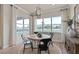 Bright dining area with large windows and stylish lighting at 2141 Weatherly Way, Orlando, FL 32820