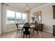 Bright dining area with large windows and views of the community at 2141 Weatherly Way, Orlando, FL 32820
