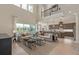 Open-concept living area with high ceilings and seamless indoor-outdoor living at 2141 Weatherly Way, Orlando, FL 32820