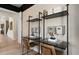 Modern office with desk and minimalist shelving at 2141 Weatherly Way, Orlando, FL 32820