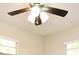 Bedroom with ceiling fan and natural light from the dual windows at 2519 Poinsetta Ave, Sanford, FL 32773