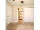 Cozy bedroom with neutral walls, plush carpet and bathroom en-suite at 2519 Poinsetta Ave, Sanford, FL 32773