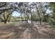 Large home on acreage with many mature trees providing lots of shade and a country setting at 2525 W Ponkan Rd, Apopka, FL 32712