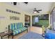 Screened lanai with comfortable seating and a view of the backyard at 2525 W Ponkan Rd, Apopka, FL 32712