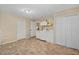 Well lit laundry room features a washer, dryer, folding station, and closet at 2525 W Ponkan Rd, Apopka, FL 32712