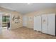 Large mud room, with a laundry room themed canvas and a double door refrigerator at 2525 W Ponkan Rd, Apopka, FL 32712
