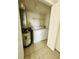 A dedicated laundry room equipped with essential appliances for convenient in-unit washing at 3428 Soho St # 308, Orlando, FL 32835
