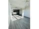 Bright and inviting living area with neutral tones, contemporary flooring, and great light, perfect for relaxation at 3428 Soho St # 308, Orlando, FL 32835