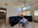 Inviting living room featuring tile floors, ceiling fan, and lots of natural light at 3522 Wd Judge Dr, Orlando, FL 32808