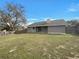 Large backyard featuring a wooden fence offering privacy at 3646 Dovetail S Ln, Lakeland, FL 33812