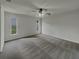 Spacious bedroom featuring carpeted floors and lots of natural light at 3646 Dovetail S Ln, Lakeland, FL 33812