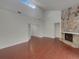 Bright living room with a stone fireplace and an open layout at 3646 Dovetail S Ln, Lakeland, FL 33812