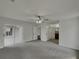 Large main bedroom with a ceiling fan and access to an ensuite bathroom at 3646 Dovetail S Ln, Lakeland, FL 33812