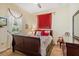 Bedroom with a queen-size bed, window, curtains, and dresser at 3696 Peacepipe Ct, Clermont, FL 34711