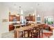 Spacious kitchen with a breakfast bar and stainless steel appliances for modern living at 3696 Peacepipe Ct, Clermont, FL 34711