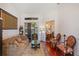 Cozy living room with comfortable seating, warm lighting, and hardwood floors at 3696 Peacepipe Ct, Clermont, FL 34711